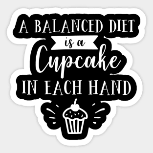 A Balanced Diet Is A Cupcake In Each Hand Sticker